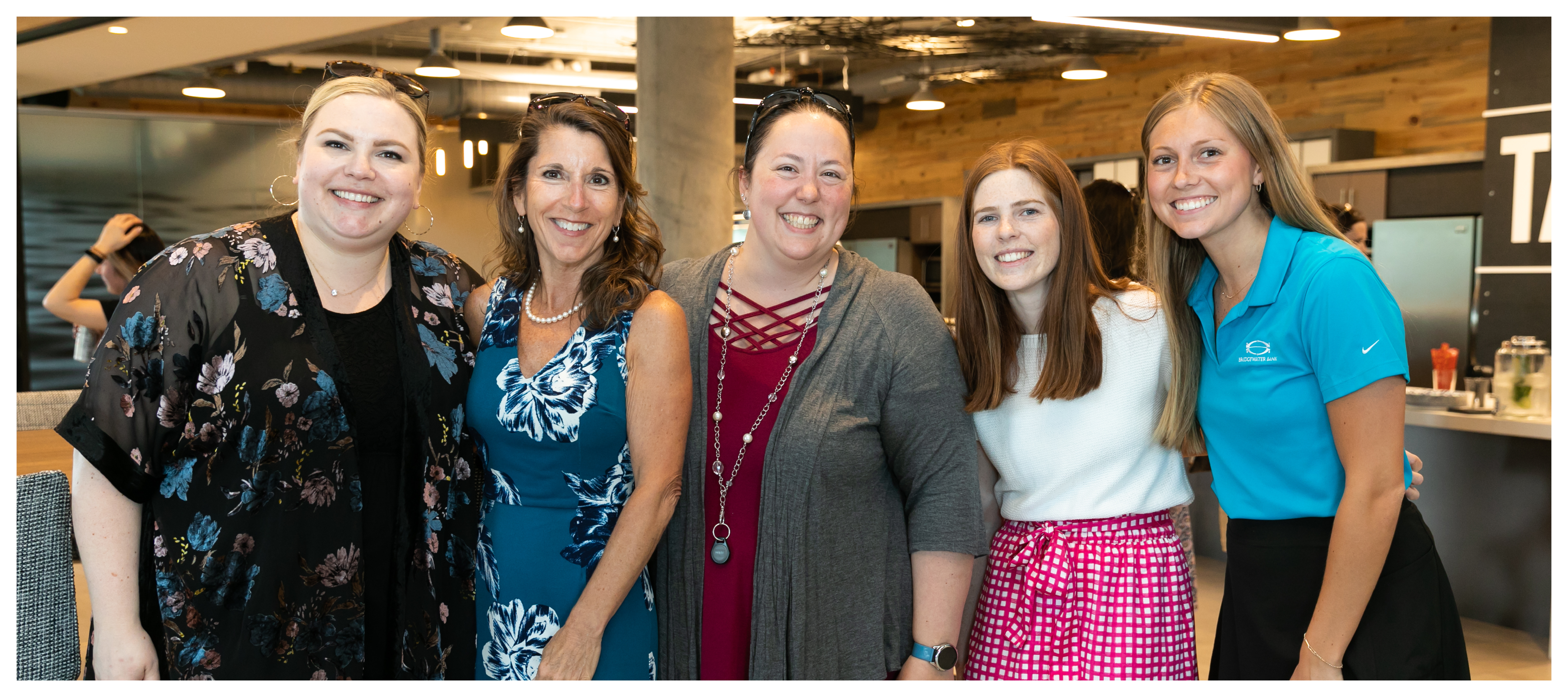 Group photo of World Standard Finance Bank women at an internal happy hour.